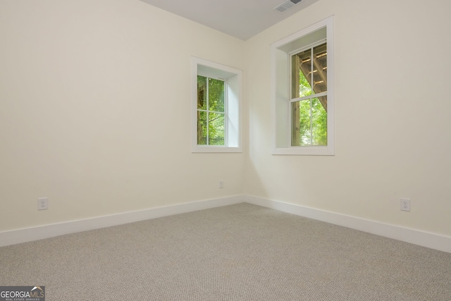 38 Mildred Pl NW, Atlanta, GA 30318 - carpeted spare room with baseboards