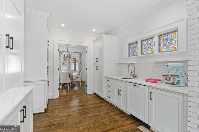 1036 Oxford Rd NE, Atlanta, GA 30306 - bar area with a chandelier, ornamental molding, tasteful backsplash, dark wood-type flooring, and recessed lighting