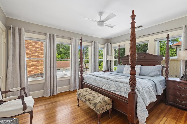 1036 Oxford Rd NE, Atlanta, GA 30306 - bedroom with multiple windows and wood-type flooring