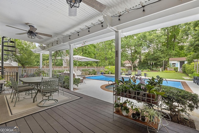 1036 Oxford Rd NE, Atlanta, GA 30306 - wooden deck featuring outdoor dining area, ceiling fan, and a fenced backyard