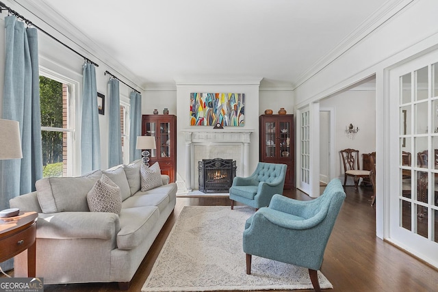 1036 Oxford Rd NE, Atlanta, GA 30306 - living room featuring wood finished floors, crown molding, and a warm lit fireplace