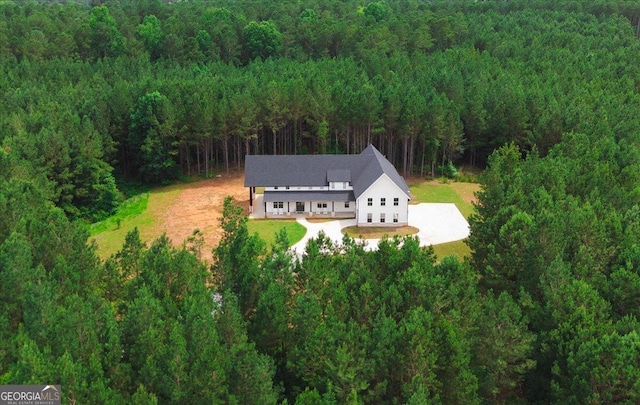 1585 Parks Rd, Forsyth, GA 31029 - aerial view of property and surrounding area featuring a heavily wooded area