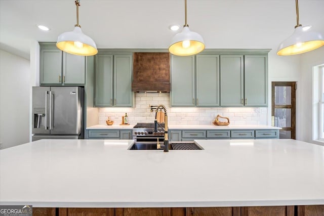 1585 Parks Rd, Forsyth, GA 31029 - kitchen with appliances with stainless steel finishes, custom exhaust hood, tasteful backsplash, light countertops, and recessed lighting