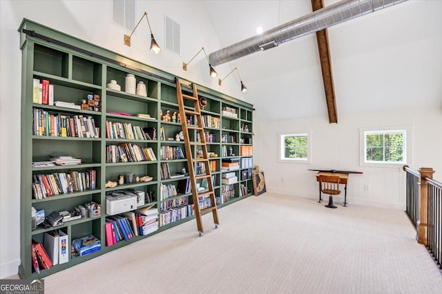 1585 Parks Rd, Forsyth, GA 31029 - living area featuring carpet, beam ceiling, and high vaulted ceiling