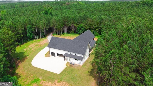 1585 Parks Rd, Forsyth, GA 31029 - aerial view of property and surrounding area with a heavily wooded area