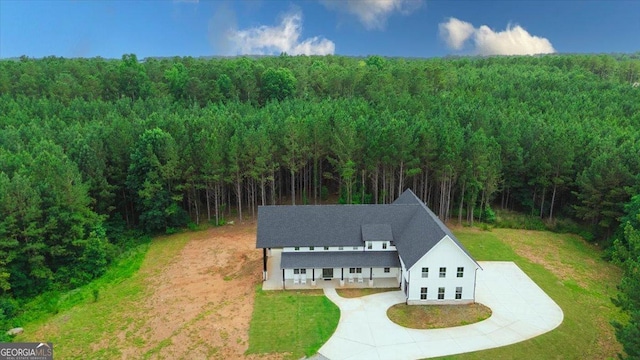 1585 Parks Rd, Forsyth, GA 31029 - aerial view of property and surrounding area featuring a forest