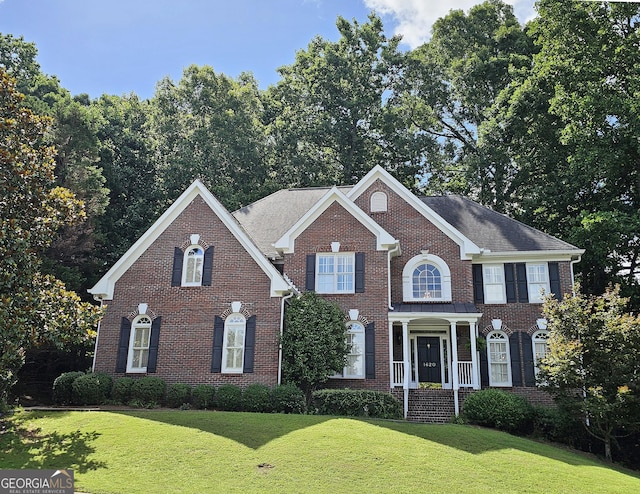 1620 Silverleaf Way, Alpharetta, GA 30005 - colonial home featuring a front yard and brick siding