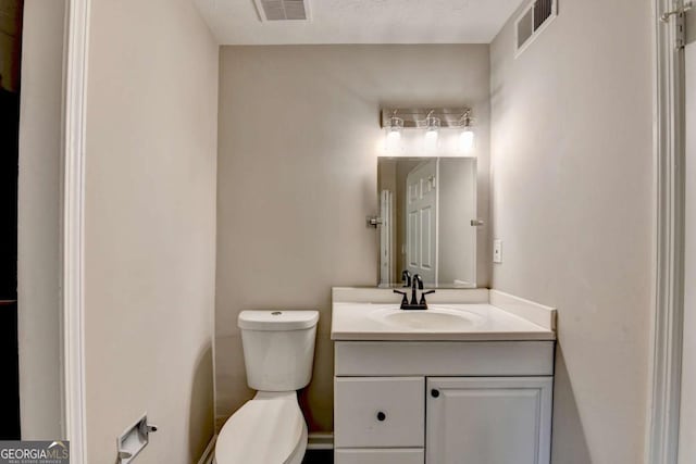 6221 Willow Run Rd, Peachtree Corners, GA 30092 - bathroom with toilet and vanity