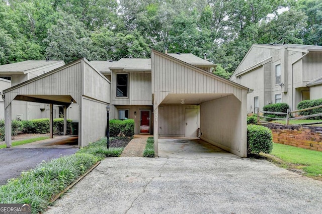 6221 Willow Run Rd, Peachtree Corners, GA 30092 - view of front facade featuring asphalt driveway and a carport