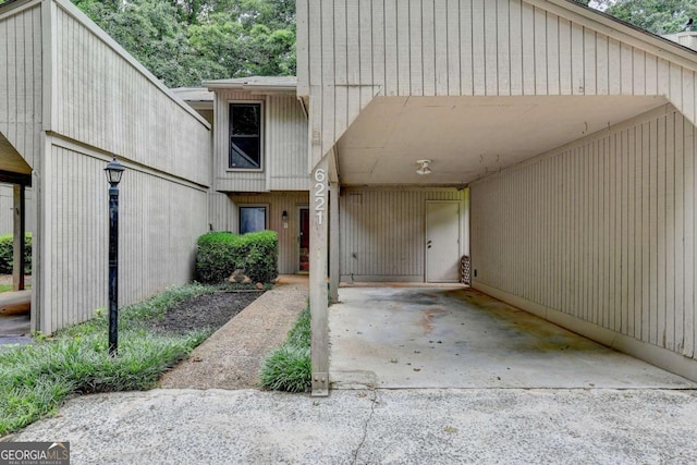 6221 Willow Run Rd, Peachtree Corners, GA 30092 - doorway to property with an attached carport