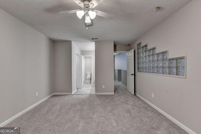 6221 Willow Run Rd, Peachtree Corners, GA 30092 - unfurnished bedroom featuring carpet flooring, ensuite bathroom, and ceiling fan