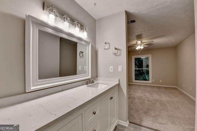 6221 Willow Run Rd, Peachtree Corners, GA 30092 - bathroom featuring a ceiling fan, vanity, and a textured ceiling