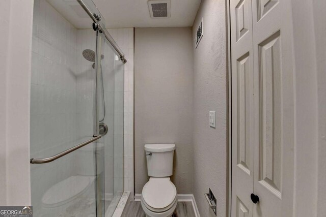 6221 Willow Run Rd, Peachtree Corners, GA 30092 - bathroom with toilet and a shower stall
