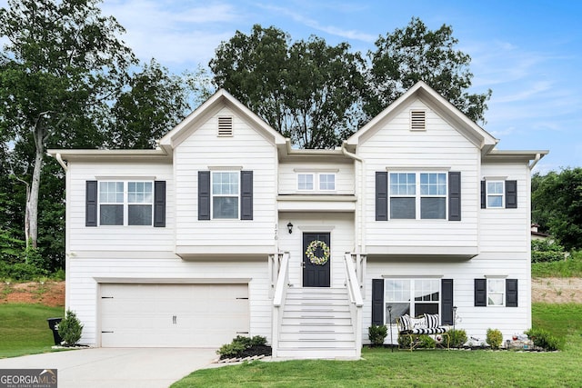 176 Malbone St SW, Cartersville, GA 30120 - raised ranch featuring concrete driveway, a front lawn, and a garage