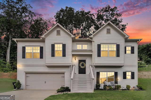 176 Malbone St SW, Cartersville, GA 30120 - view of front of house featuring an attached garage, concrete driveway, and a yard