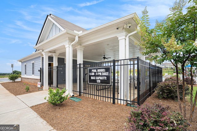 176 Malbone St SW, Cartersville, GA 30120 - view of property exterior with ceiling fan, board and batten siding, and a porch