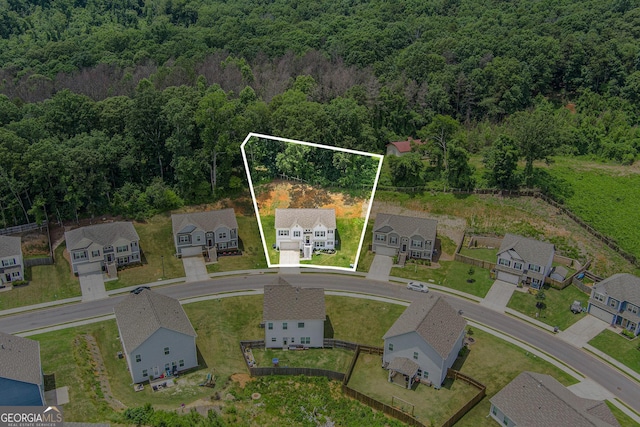 176 Malbone St SW, Cartersville, GA 30120 - aerial perspective of suburban area with a forest and property parcel outlined