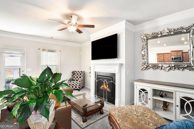 176 Malbone St SW, Cartersville, GA 30120 - living area with ceiling fan, a lit fireplace, and crown molding