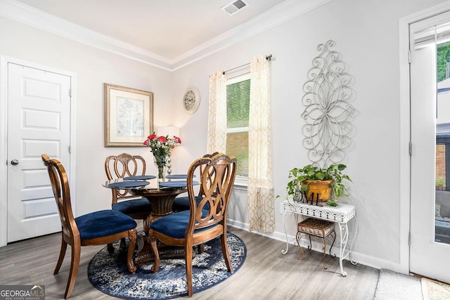176 Malbone St SW, Cartersville, GA 30120 - dining room with wood finished floors and crown molding