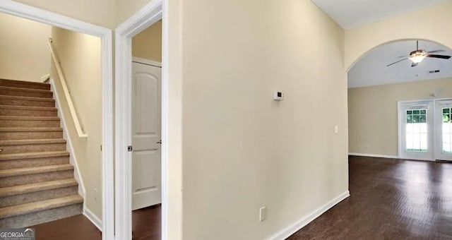 176 Calm Oaks Cir, Savannah, GA 31419 - hall with arched walkways, stairway, and wood finished floors