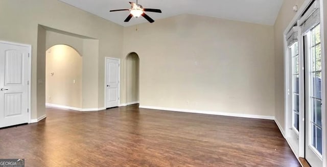 176 Calm Oaks Cir, Savannah, GA 31419 - spare room with arched walkways, ceiling fan, lofted ceiling, and dark wood finished floors