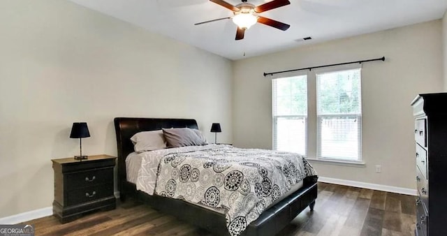 176 Calm Oaks Cir, Savannah, GA 31419 - bedroom with multiple windows, dark wood-style floors, and ceiling fan