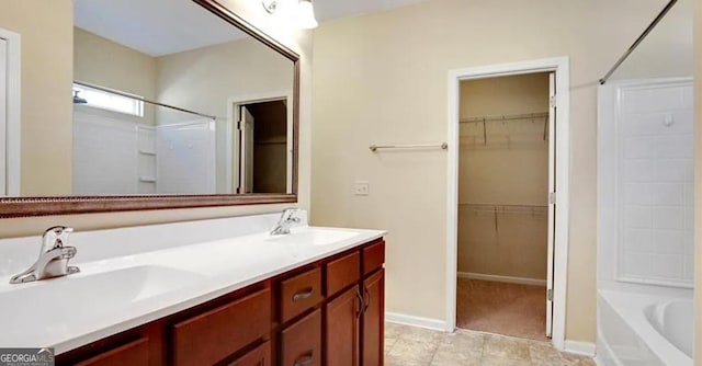 176 Calm Oaks Cir, Savannah, GA 31419 - bathroom with a shower, a tub, double vanity, and a spacious closet