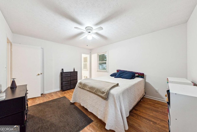 155 Windy Hill Ct, Alpharetta, GA 30004 - bedroom with wood finished floors, ceiling fan, and a textured ceiling