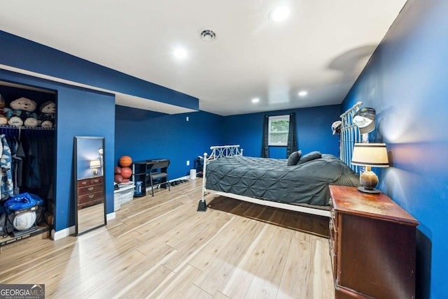155 Windy Hill Ct, Alpharetta, GA 30004 - bedroom with wood finished floors, recessed lighting, and a closet