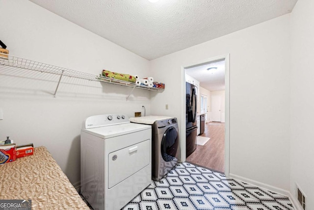 155 Windy Hill Ct, Alpharetta, GA 30004 - laundry room with independent washer and dryer and baseboards