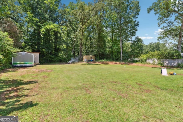 155 Windy Hill Ct, Alpharetta, GA 30004 - view of green lawn with a shed