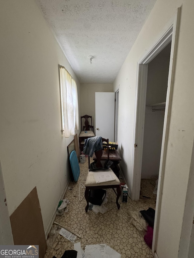 8373 Chicago Ave, Douglasville, GA 30134 - bedroom featuring a textured ceiling and a closet