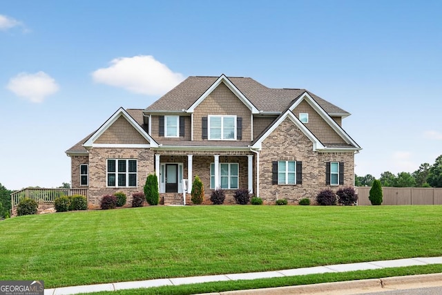 2112 Meadowood Cv, Monroe, GA 30655 - craftsman inspired home featuring a porch and brick siding