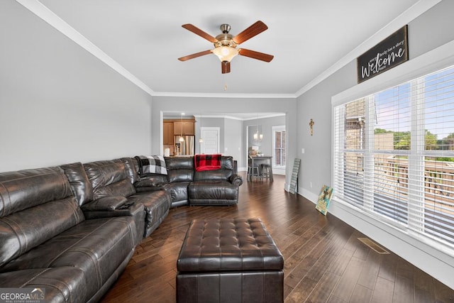 2112 Meadowood Cv, Monroe, GA 30655 - living area with a ceiling fan, dark wood-style floors, and crown molding