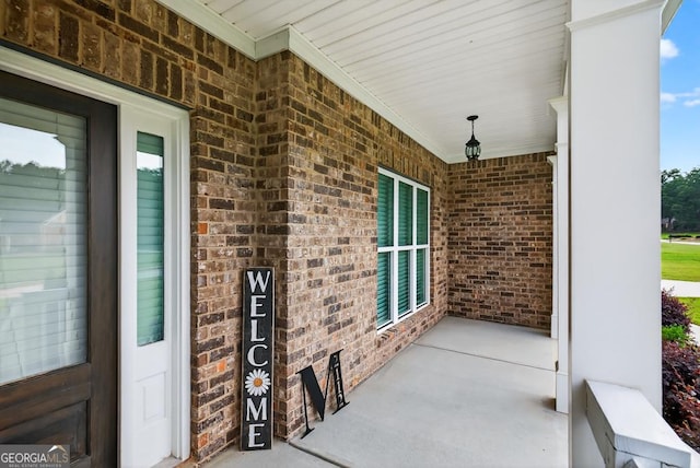 2112 Meadowood Cv, Monroe, GA 30655 - view of covered porch
