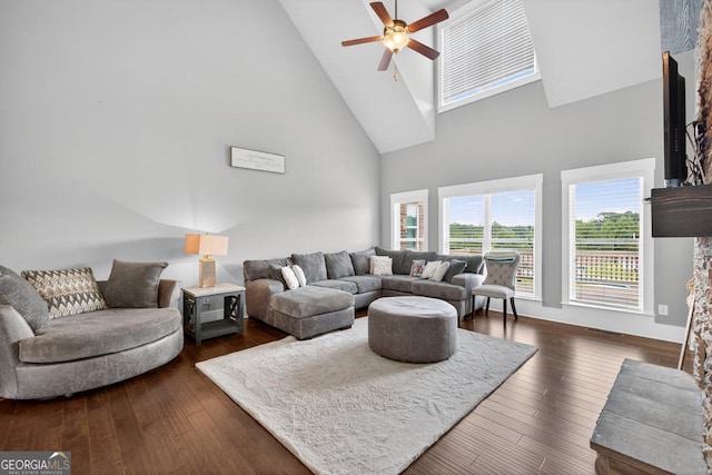 2112 Meadowood Cv, Monroe, GA 30655 - living room with high vaulted ceiling, ceiling fan, dark wood finished floors, and a fireplace