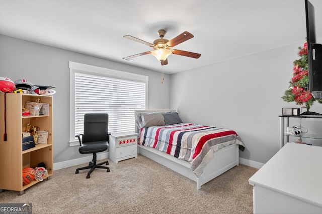2112 Meadowood Cv, Monroe, GA 30655 - carpeted bedroom featuring baseboards and ceiling fan
