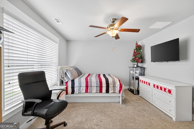 2112 Meadowood Cv, Monroe, GA 30655 - bedroom featuring light colored carpet, ceiling fan, and a desk