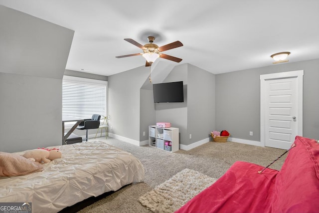 2112 Meadowood Cv, Monroe, GA 30655 - carpeted bedroom featuring vaulted ceiling and a ceiling fan