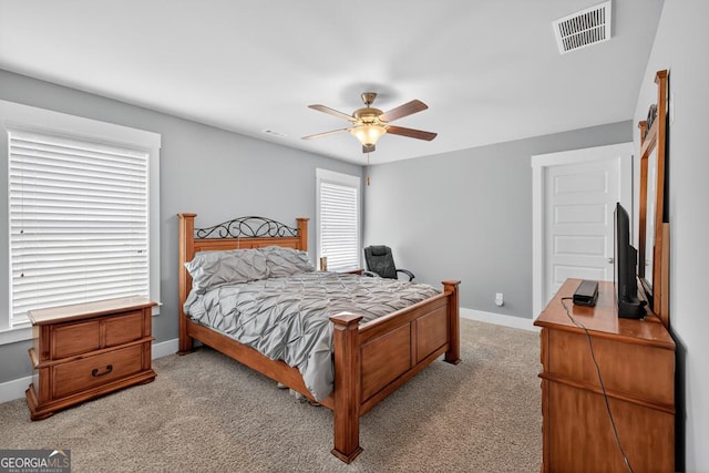 2112 Meadowood Cv, Monroe, GA 30655 - bedroom with light colored carpet and ceiling fan