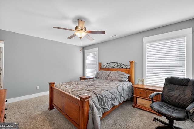 2112 Meadowood Cv, Monroe, GA 30655 - carpeted bedroom with a ceiling fan and baseboards
