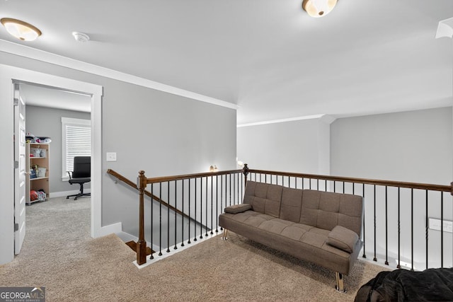 2112 Meadowood Cv, Monroe, GA 30655 - hallway with an upstairs landing, carpet, crown molding, and a desk