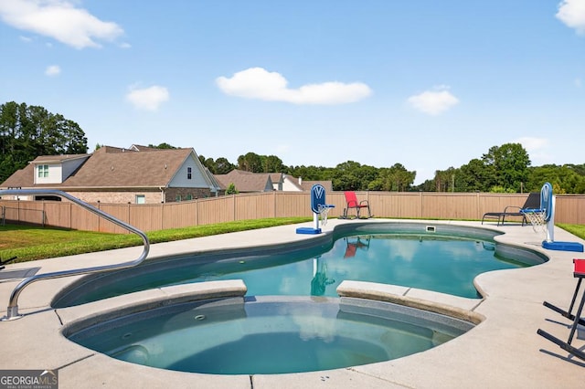 2112 Meadowood Cv, Monroe, GA 30655 - view of swimming pool with a fenced backyard, a patio area, and a pool with connected hot tub