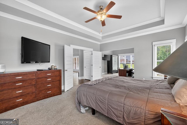 2112 Meadowood Cv, Monroe, GA 30655 - bedroom with a raised ceiling, carpet floors, ornamental molding, and ceiling fan