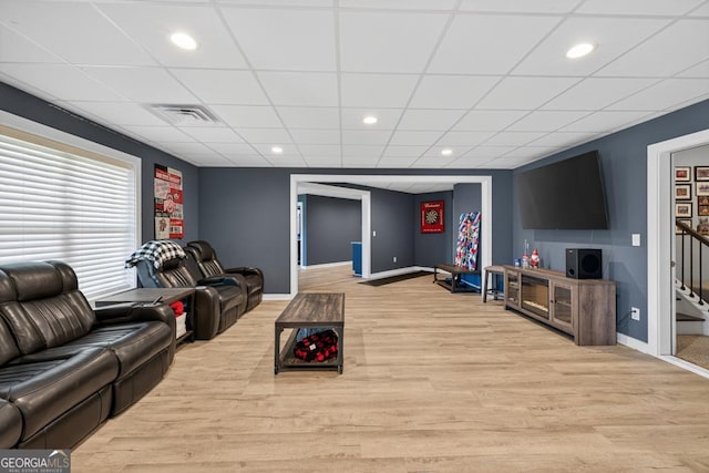 2112 Meadowood Cv, Monroe, GA 30655 - living area with wood finished floors, recessed lighting, a paneled ceiling, and stairs