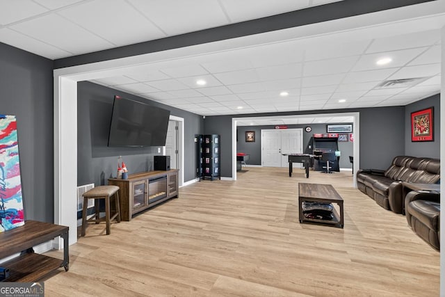 2112 Meadowood Cv, Monroe, GA 30655 - living room with light wood-style floors, recessed lighting, and a paneled ceiling