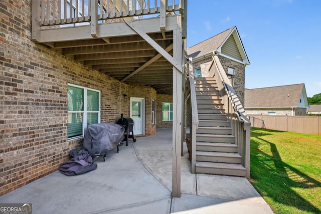 2112 Meadowood Cv, Monroe, GA 30655 - view of patio with stairs and area for grilling