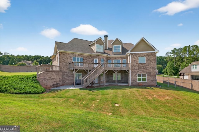 2112 Meadowood Cv, Monroe, GA 30655 - rear view of house with a deck, stairway, brick siding, a patio, and a chimney