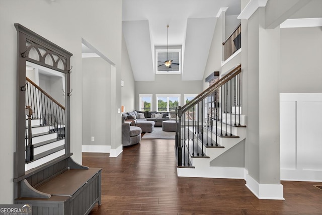 2112 Meadowood Cv, Monroe, GA 30655 - foyer featuring high vaulted ceiling, stairway, wood finished floors, and ceiling fan