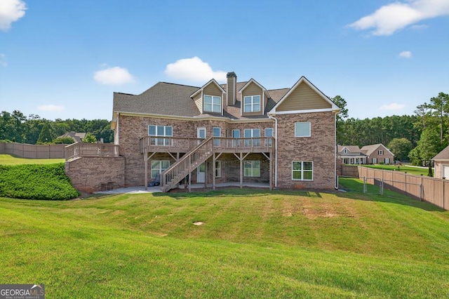 2112 Meadowood Cv, Monroe, GA 30655 - rear view of property with a wooden deck, a chimney, stairs, brick siding, and a patio area